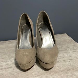 Lightly worn Jennifer Lopez high heel shoe